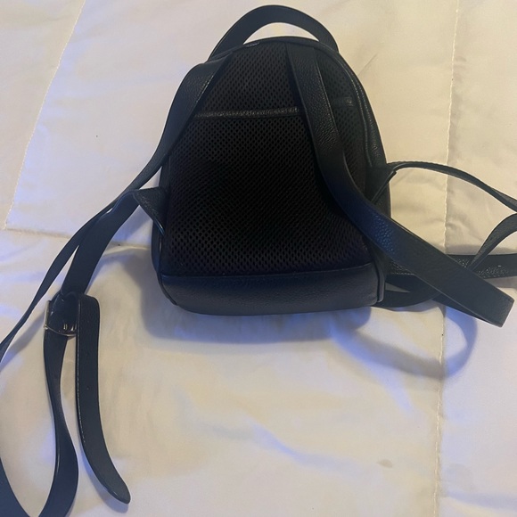 Width:7.9 in
Height:11.8 in
Depth:3.1 in

Mini back pack . Great condition - Picture 2 of 2